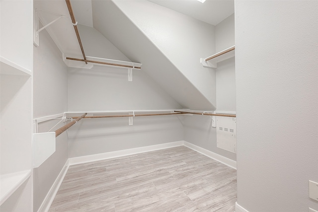 walk in closet featuring light wood-type flooring