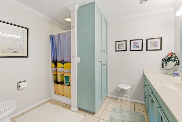 bathroom with a textured ceiling, ornamental molding, vanity, and toilet