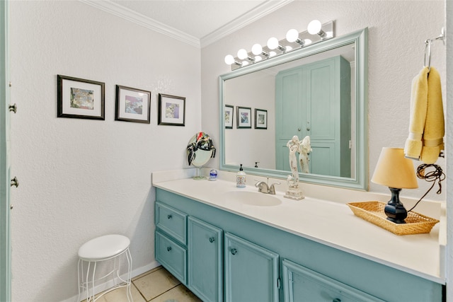 bathroom with tile flooring, crown molding, and large vanity