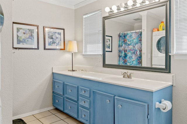 bathroom with tile flooring, crown molding, oversized vanity, stacked washer and clothes dryer, and a wealth of natural light