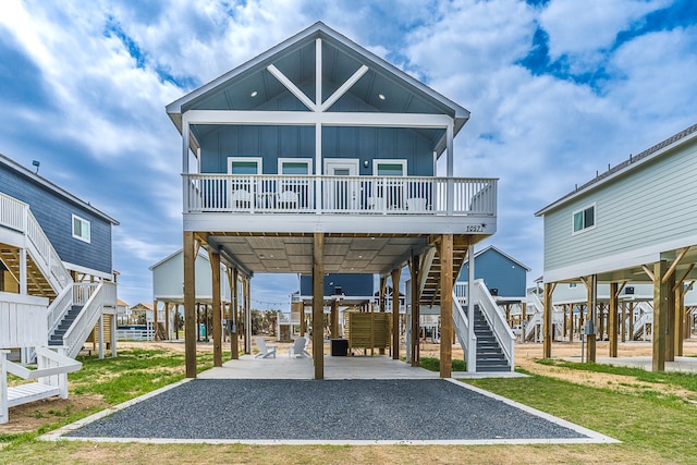 exterior space with a front yard and a carport