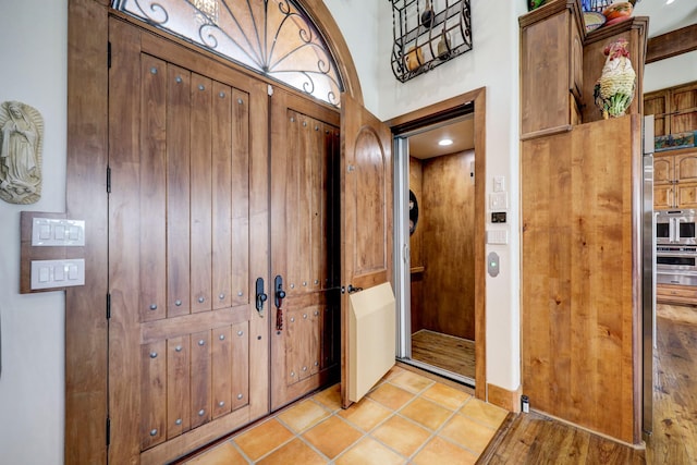 view of tiled foyer entrance