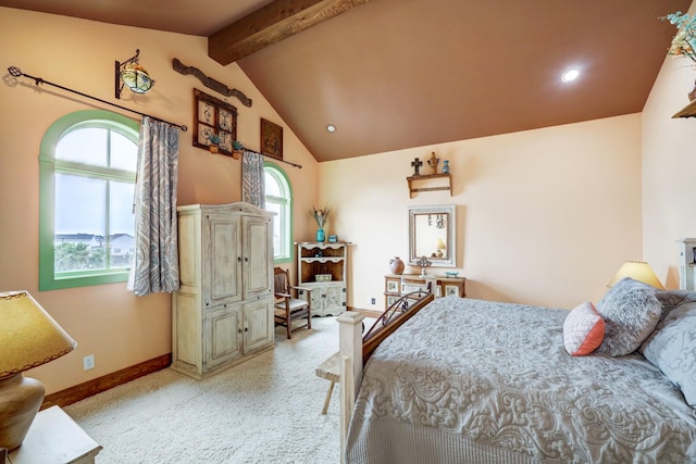 bedroom featuring vaulted ceiling with beams