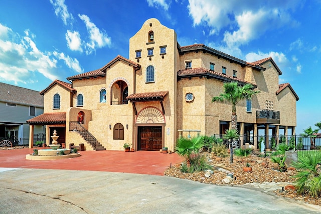 view of front of property with a garage