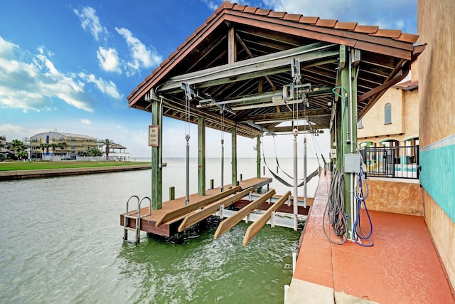 dock area with a water view