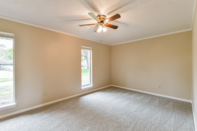 spare room featuring a textured ceiling, carpet flooring, and ceiling fan