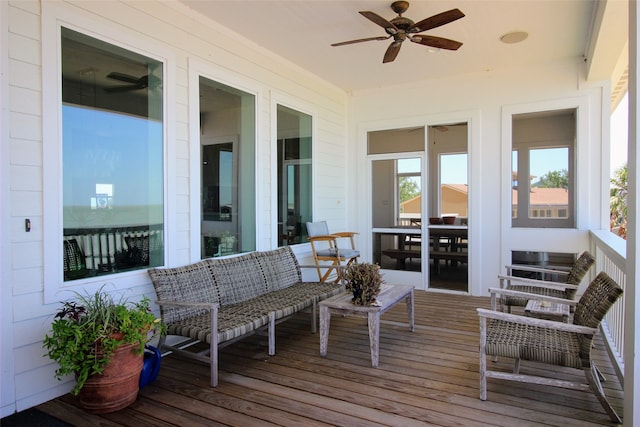 wooden deck with ceiling fan