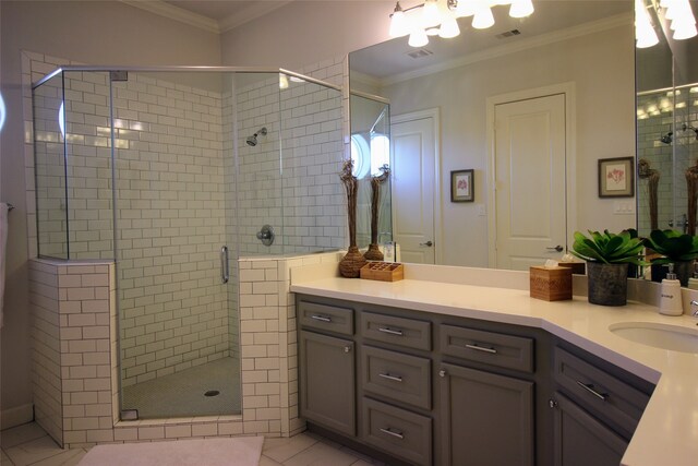 bathroom featuring walk in shower, tile flooring, crown molding, and vanity