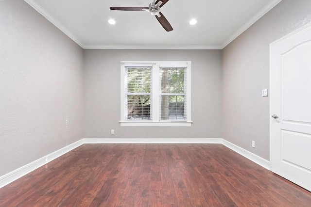 unfurnished room with dark hardwood / wood-style floors, ornamental molding, and ceiling fan