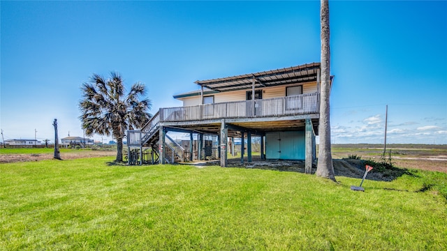 back of house featuring a yard