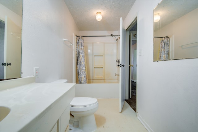 full bathroom with vanity, a textured ceiling, shower / bath combo, and toilet