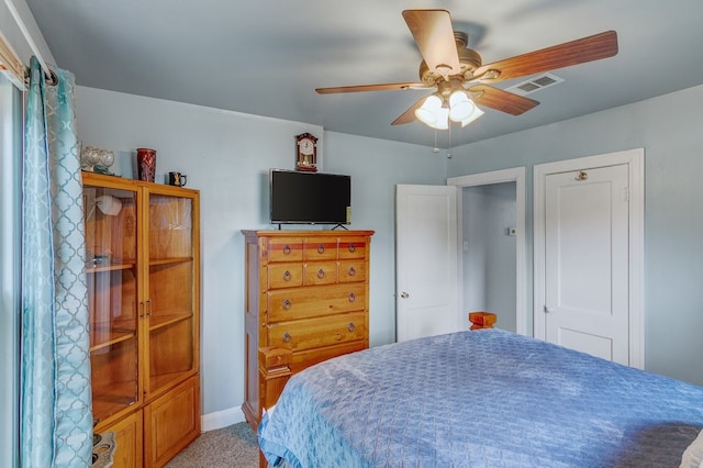 bedroom with light colored carpet and ceiling fan