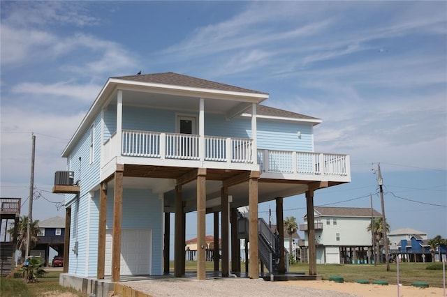 rear view of property featuring central AC