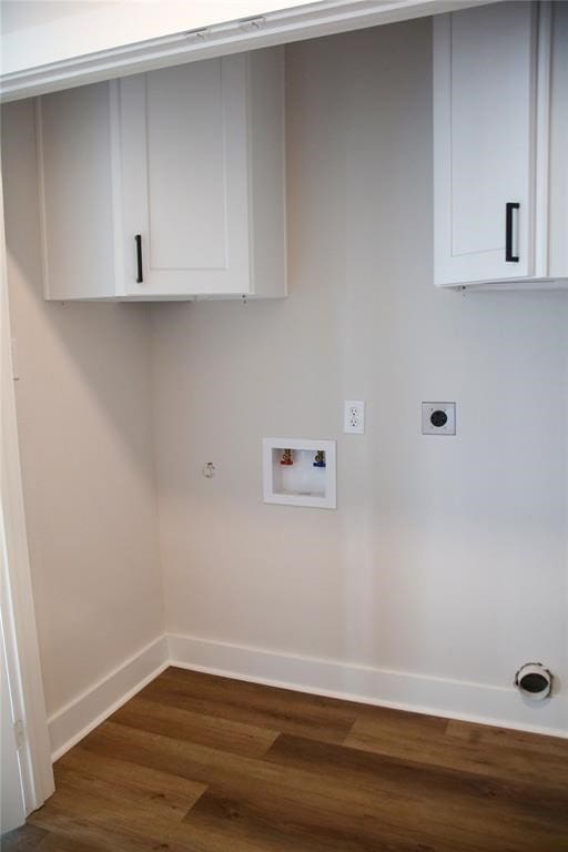 clothes washing area featuring hookup for a gas dryer, dark hardwood / wood-style flooring, hookup for a washing machine, and hookup for an electric dryer