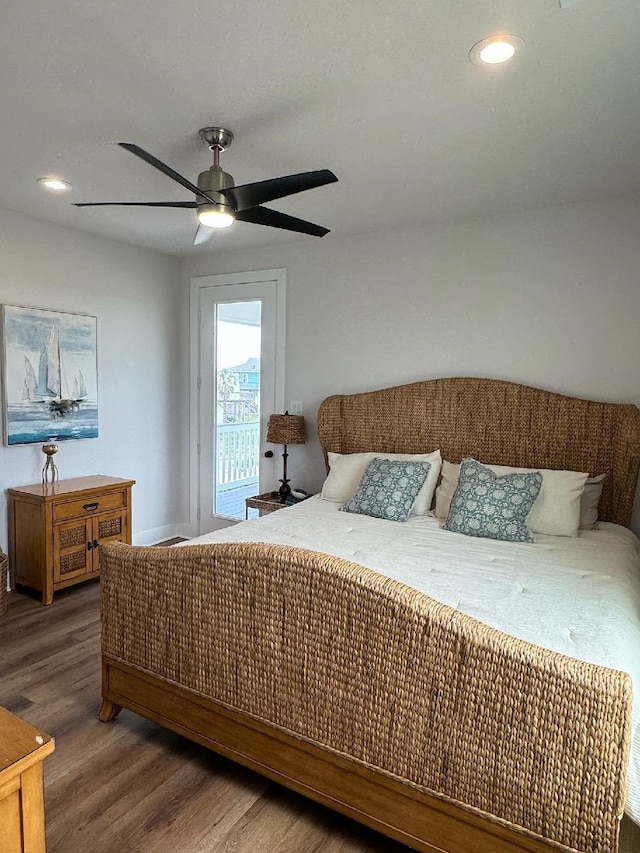 bedroom with ceiling fan, access to outside, and hardwood / wood-style flooring