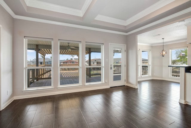 unfurnished room featuring dark wood-type flooring and crown molding