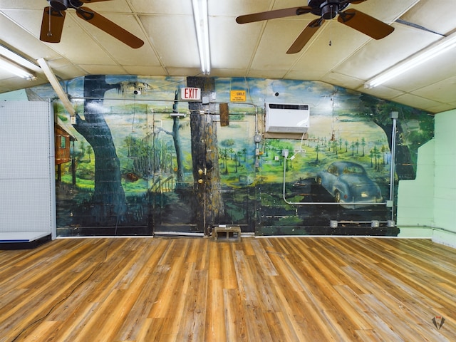 interior space featuring vaulted ceiling, ceiling fan, and hardwood / wood-style flooring