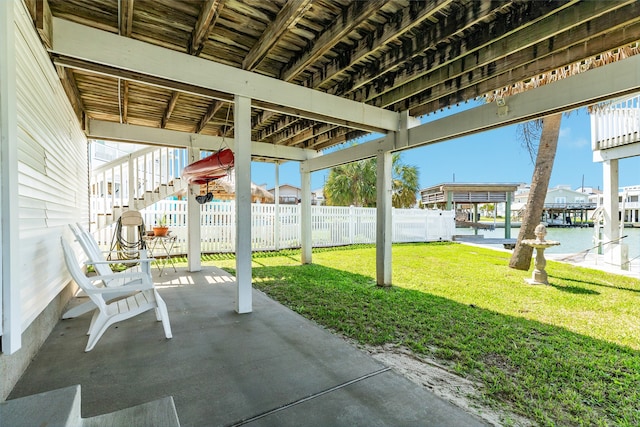 view of patio / terrace with a water view