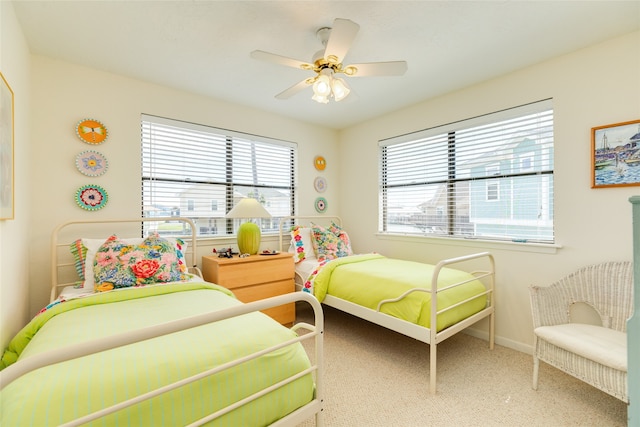 bedroom with carpet and ceiling fan