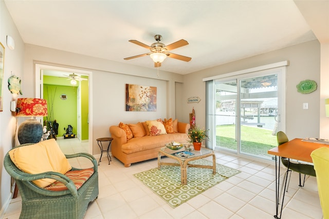 living room with ceiling fan and light tile patterned floors