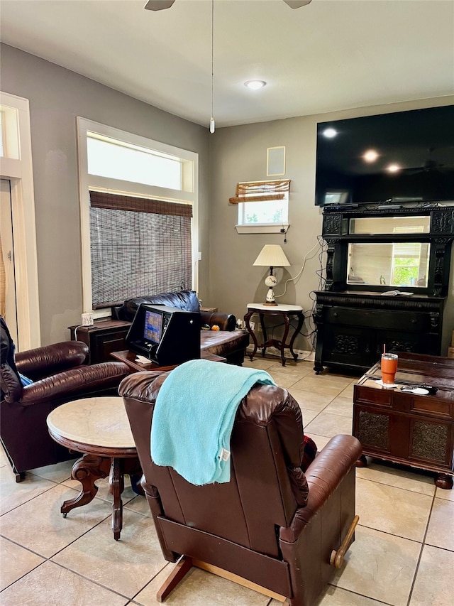 living room featuring light tile floors