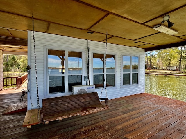 exterior space featuring a wooden deck