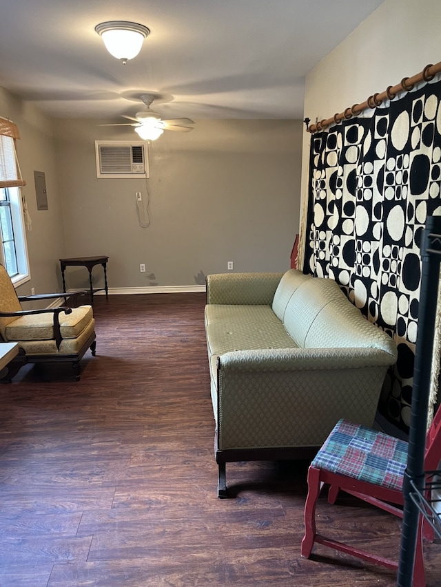 living room with a wall mounted AC, ceiling fan, and dark wood-type flooring