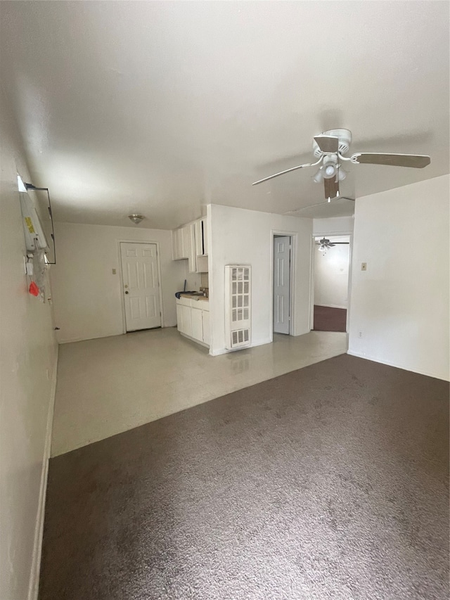 interior space featuring ceiling fan