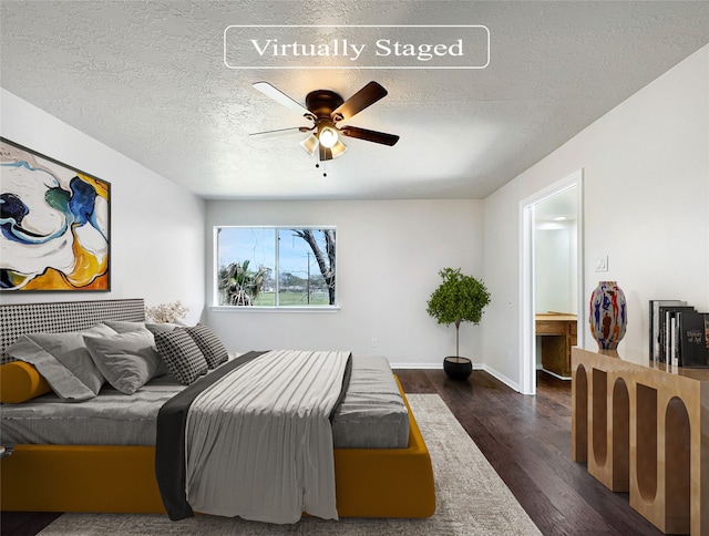 bedroom with dark hardwood / wood-style flooring, a textured ceiling, and ceiling fan