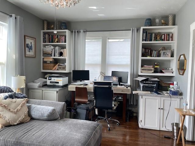 office with dark wood-type flooring