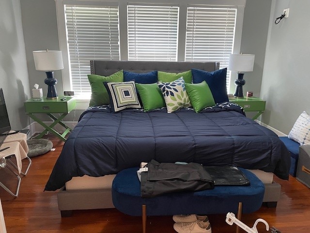 bedroom featuring dark hardwood / wood-style floors