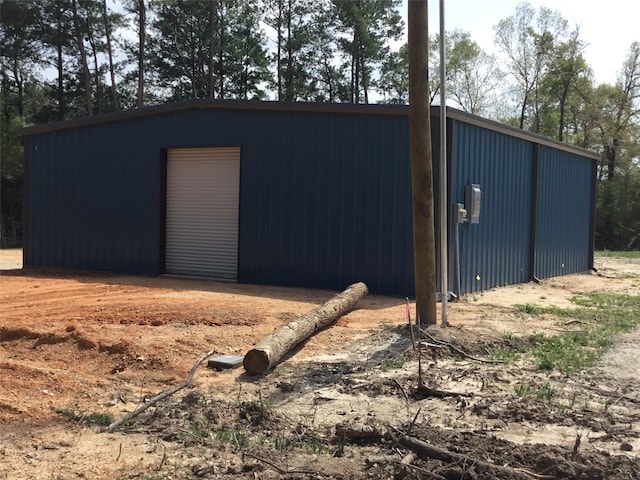 view of shed / structure featuring a garage