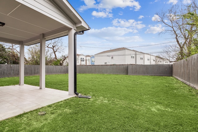 view of yard featuring a fenced backyard and a patio