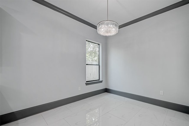 empty room featuring marble finish floor, baseboards, and an inviting chandelier