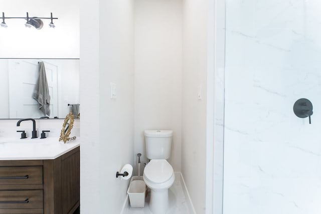 bathroom featuring tile flooring, walk in shower, vanity, and toilet