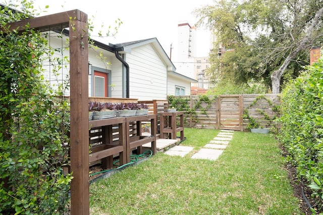 view of yard with a wooden deck