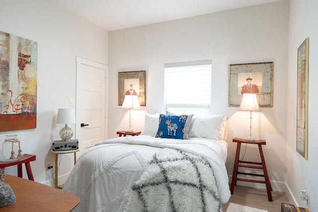 bedroom featuring light hardwood / wood-style flooring