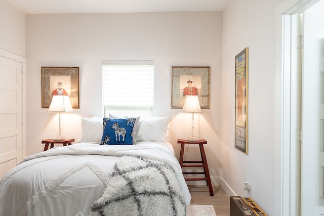 bedroom featuring light hardwood / wood-style flooring