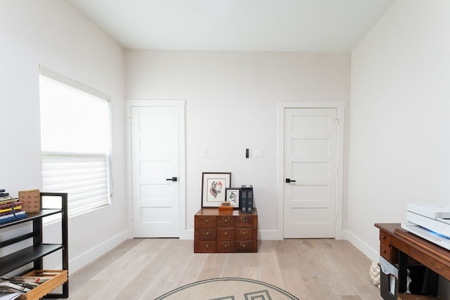 interior space with plenty of natural light and light wood-type flooring