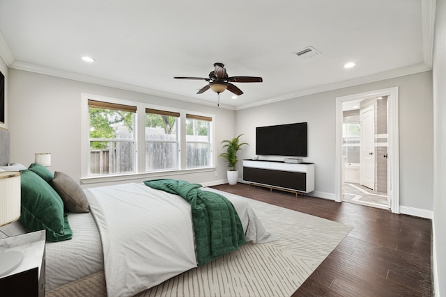 bedroom featuring ornamental molding, dark wood-type flooring, and ceiling fan