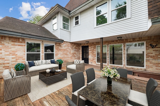 wooden deck featuring an outdoor hangout area