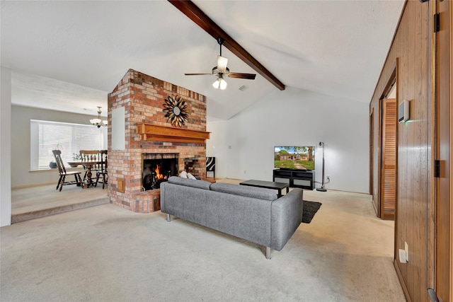 living room with light colored carpet, a fireplace, ceiling fan with notable chandelier, and vaulted ceiling with beams