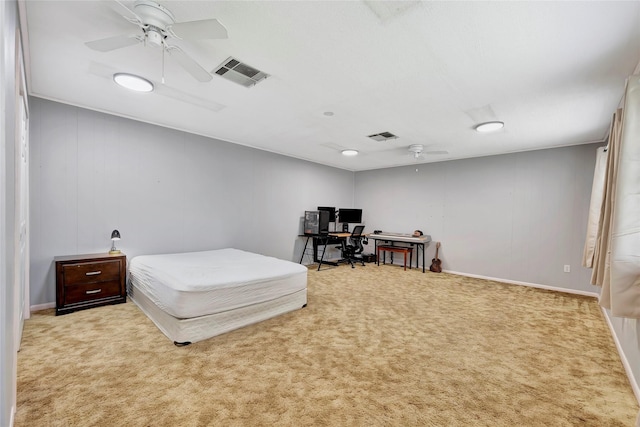 bedroom featuring light carpet and ceiling fan