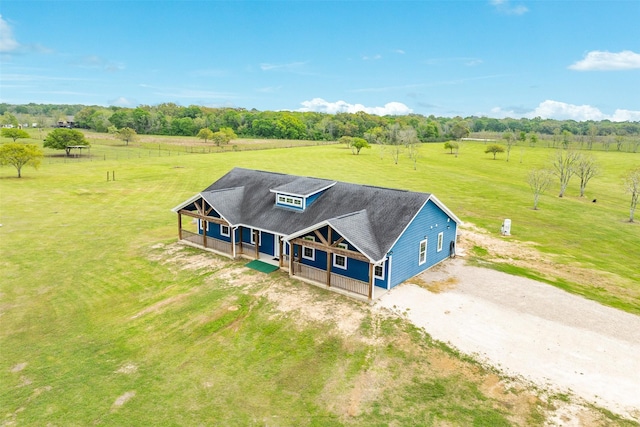 birds eye view of property with a rural view