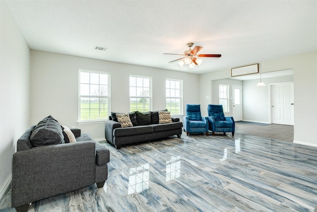 living room featuring ceiling fan