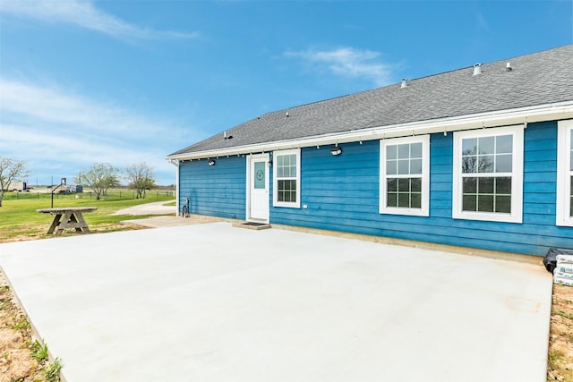 rear view of house with a patio