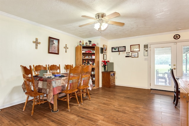 dining space with plenty of natural light, ceiling fan, dark hardwood / wood-style flooring, and a textured ceiling