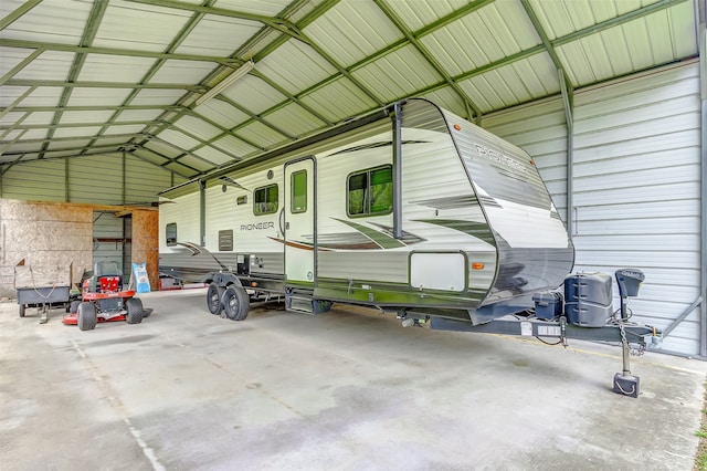 garage featuring a carport