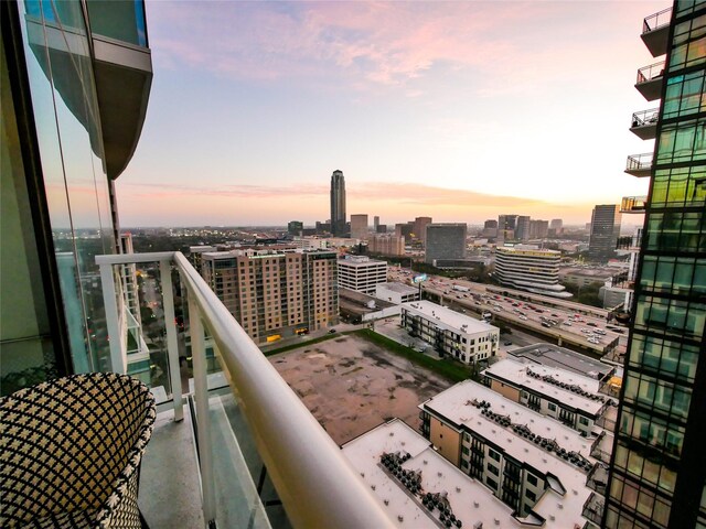 view of balcony at dusk