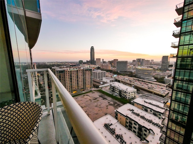 view of balcony at dusk